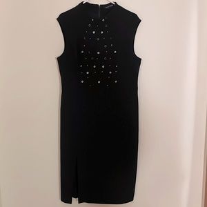 Sexy, unique LBD w/ silver grommet detail and front slit, classic & stunning!